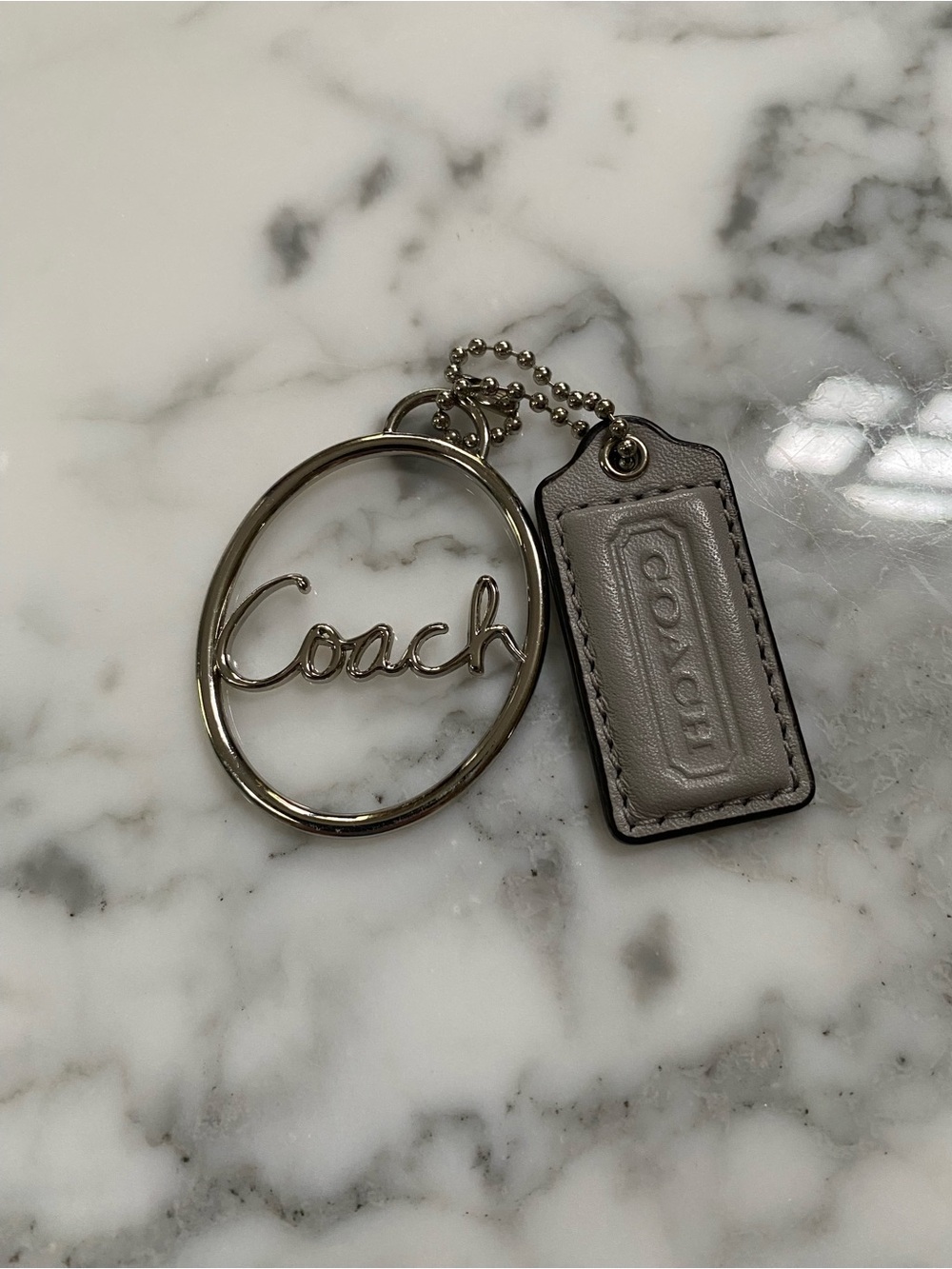Coach Silver Script with Gray Leather Tag
